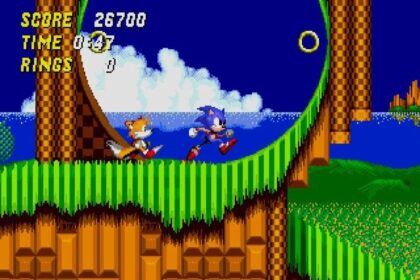 Gameplay from Sonic the Hedgehog 2 showing Sonic and Tails running through a loop in Emerald Hill Zone.